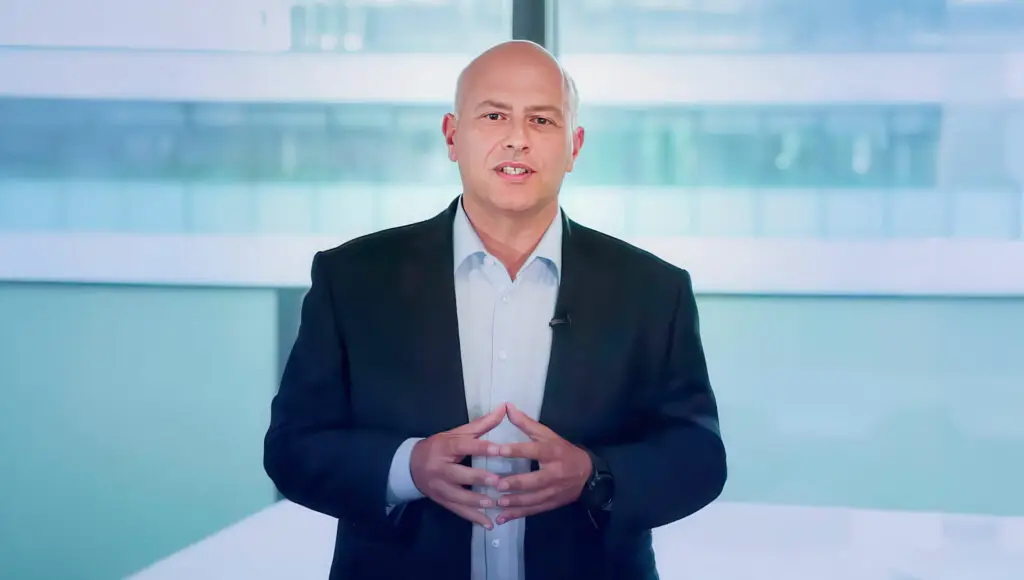 Antoine Parisi standing for an interview