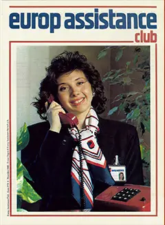Vintage Europ Assistance Club magazine cover featuring a person holding a red telephone handset, wearing a dark outfit with a patterned scarf, and a visible Europ Assistance badge
